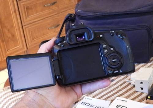 Canon 60D body only with accesories shown in Photo, has some minor signs of ues, good condition,