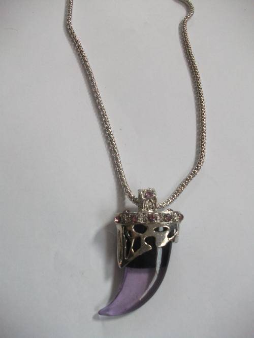 STUNNING MINITURE POPULAR SIM RHINO HORN NECKLACES(5 UP FOR GRABS SEVERAL COLOURS)