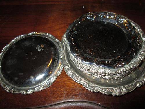 SET OF SILVER PLATED COASTERS