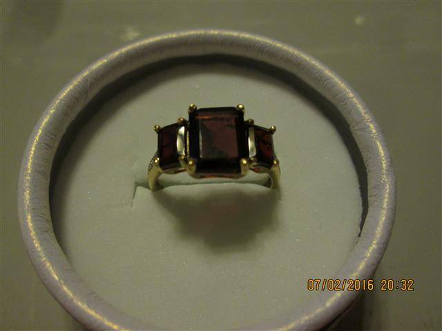 Trilogy Garnet ring set in gold