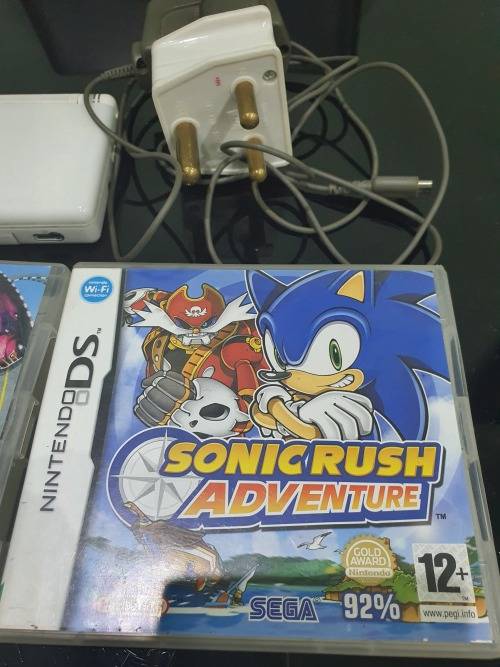 NINTENDO  DS LITE..ND TWO GAMES...HAND HELD