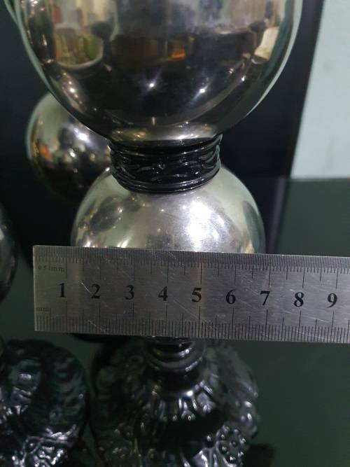 THREE STUNNING DESIGNER CANDLE HOLDERS WITH SOLID CAST IRON STAND