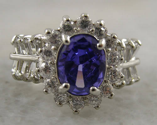 Beautiful 14kt white gold GP and 2.0ct simulated tanzanite ring.