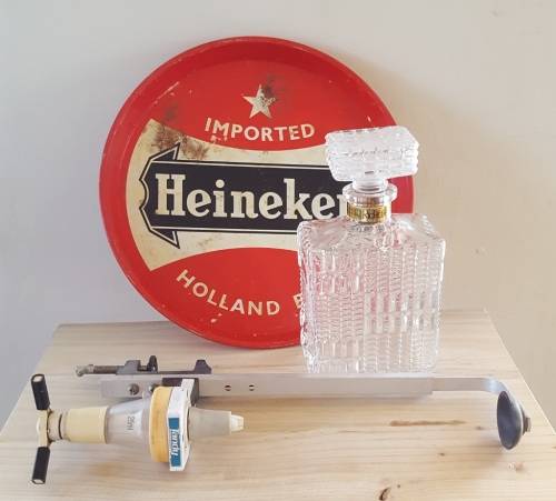 Decanter, vintage Heineken tray and optics