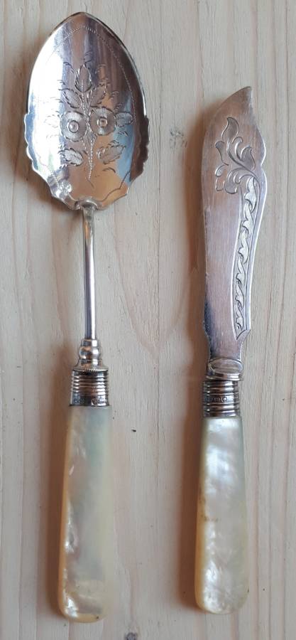 Butter knife with hallmarked cuff dated 1923 Sheffield + Spoon also 1923.