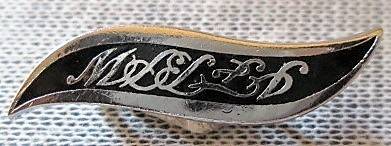 Black and Silver Pin / Badge