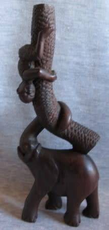 Wooden Elephant with Boy in Tree