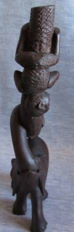 Wooden Elephant with Boy in Tree