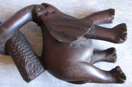 Wooden Elephant with Boy in Tree