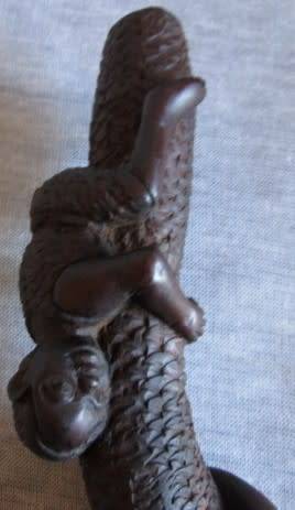 Wooden Elephant with Boy in Tree