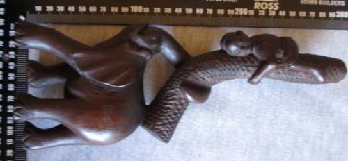 Wooden Elephant with Boy in Tree