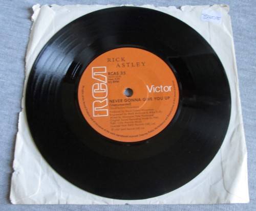 RICK ASTLEY - NEVER GONNA GIVE YOU UP 1987 (RCA 535) 45 RPM RECORD