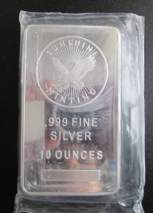 TEN TROY OUNCES...SUNSHINE MINT..  999.9%  PURE SOLID SILVER BAR