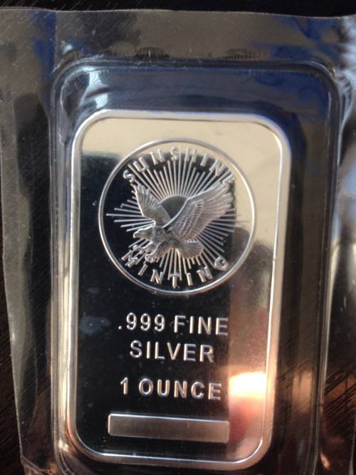 1oz     SUNSHINE    999.9%    PURE SOLID SILVER BAR  STILL COMPLETELY SEALED