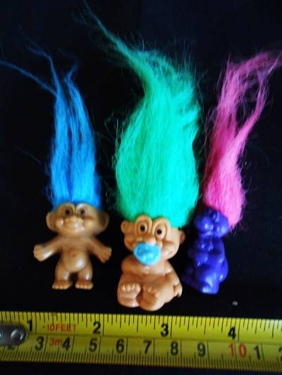 three tiny Troll  figures