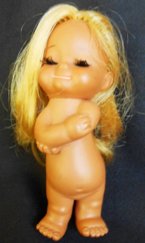 Vintage collectable IMPCO Sun Bunnies doll  sassy doll or hula doll hugging herself 1960 s