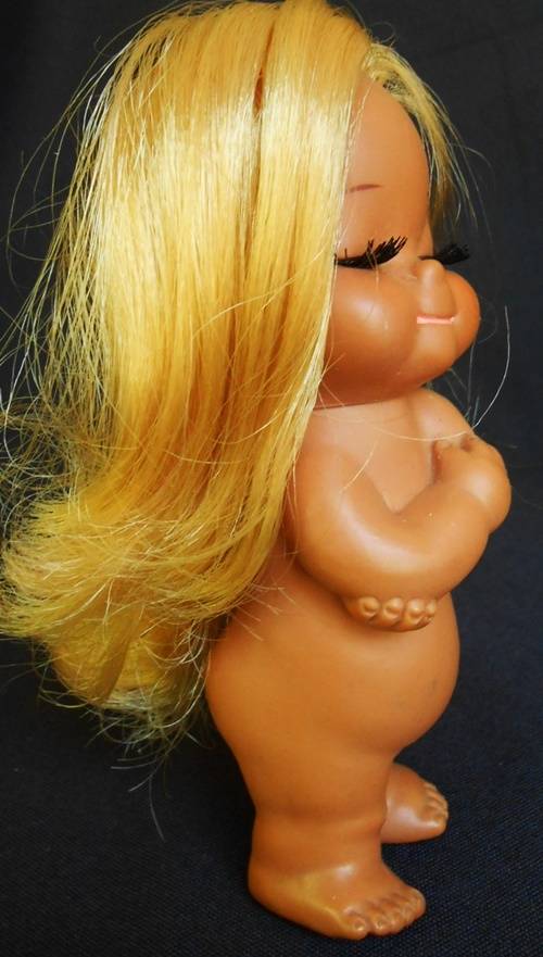 Vintage collectable IMPCO Sun Bunnies doll  sassy doll or hula doll hugging herself 1960 s