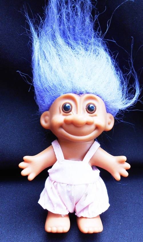 Doll collectable Troll with purple hair in pink romper suit