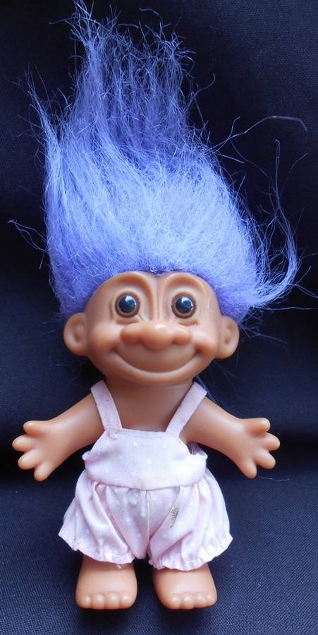 Doll collectable Troll with purple hair in pink romper suit