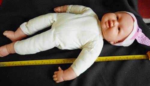 big soft bodied baby doll with brown eyes