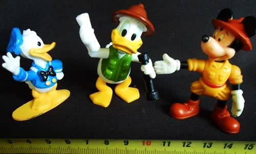 collectible disney figures mickey mouse donald duck and uncle scrooge