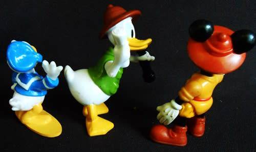 collectible disney figures mickey mouse donald duck and uncle scrooge