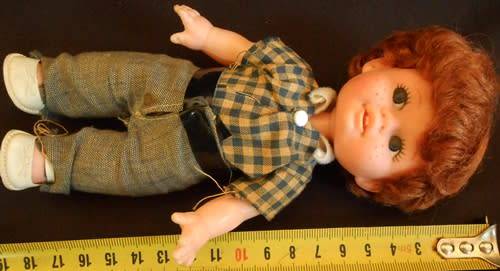 Vintage hard plastic and vinyl boy doll in original clothes made in Hong Kong