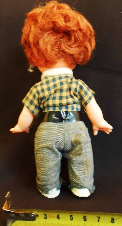 Vintage hard plastic and vinyl boy doll in original clothes made in Hong Kong