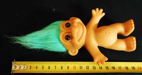 collectable vintage troll doll with turquoise hair