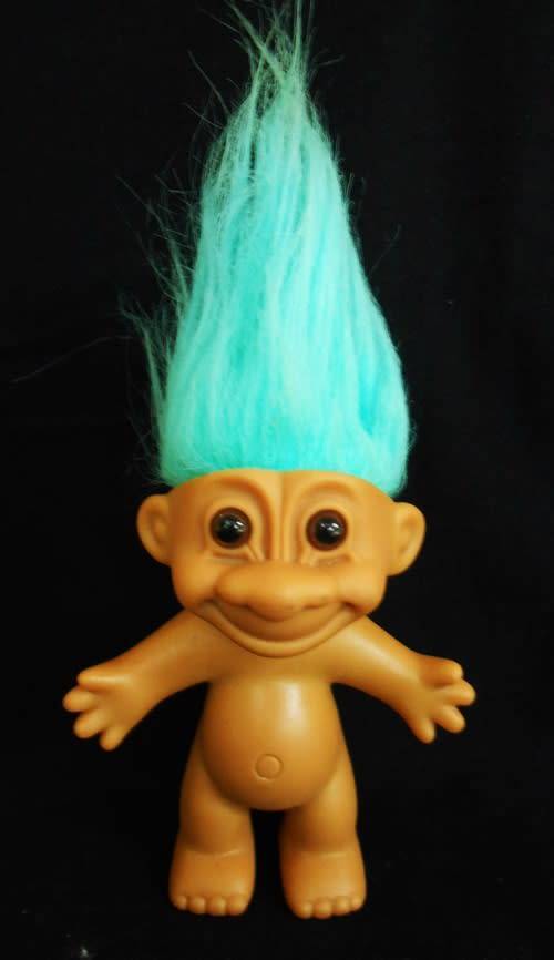 collectable vintage troll doll with turquoise hair