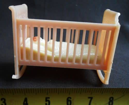 Collectable vintage hard plastic tiny toy cradle 1940-50 s by Reliable Plastic Company Canada