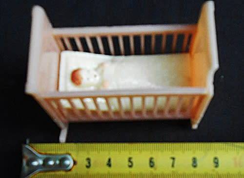Collectable vintage hard plastic tiny toy cradle 1940-50 s by Reliable Plastic Company Canada