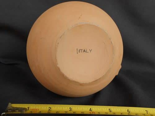 Beautiful classic shape terracotta jug with white glaze inside from Italy