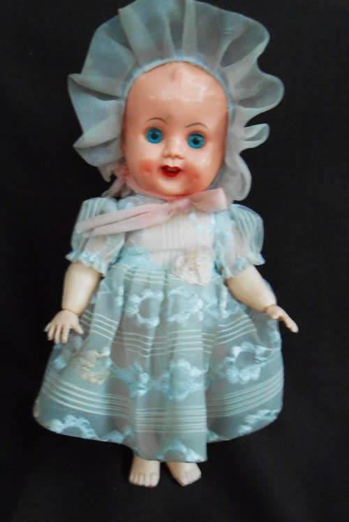 Small Vintage Evergreen Baby Doll - Sleep Eyed Hard Plastic -Moving Limbs original dress from 1950 s