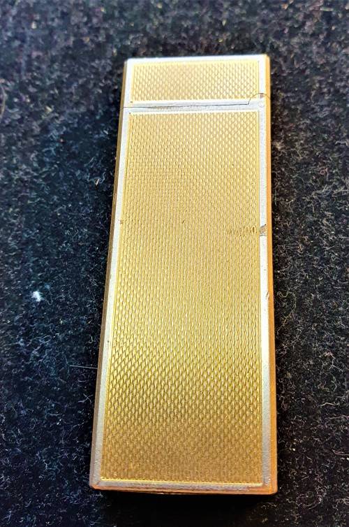 Unknown Vintage Gold coloured lighter.