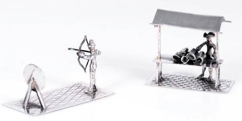 Group of four silver miniatures, each stamped XXX (possibly pseudo Dutch marks)