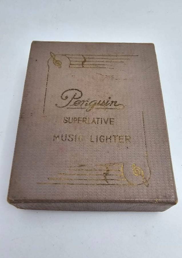 Vintage Penguin Music Lighter