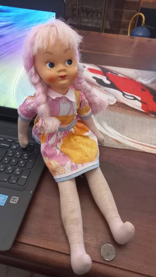 Vintage doll filled with sawdust