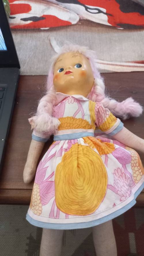 Vintage doll filled with sawdust