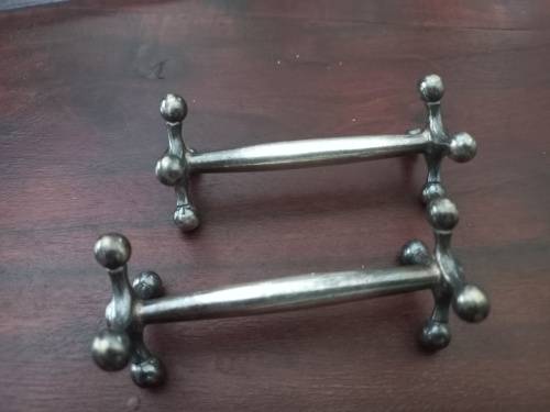 Pewter spoon and knife rests