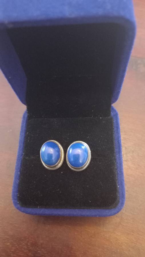 Sterling silver earrings with blue stone