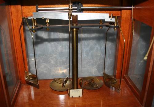 A SPECTACULAR ANTIQUE PRECISION DIAMOND SCALE IN A GLASS CASE WITH A RATCHET DOOR! EX-SAP SCALE!