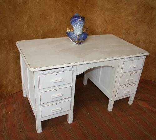 Here I have a charming shabby chic desk with 6 drawers.