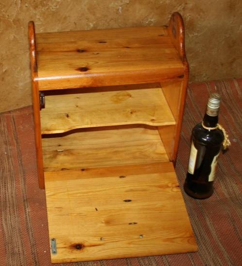 A FANTASTIC SOLLID WOOD SPICE CUPBOARD WITH A DOOR DEEP ENOUGH TO SERVE AS A CD RACK OR SIDE TABLE