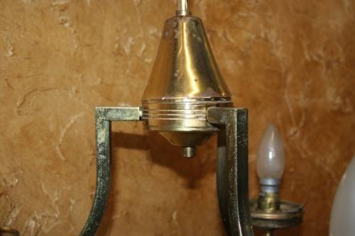 A stately three tier Vintage chandelier . The beautiful 3-light Vintage fixture is stunning working