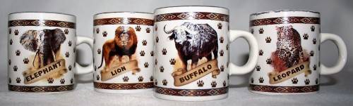 FOUR CUTE MUGS WITH PIC & DESCRIPTION ON THE BACK -  ELEPHANT, LION, BUFFALO, LEOPARD - BID PER EACH