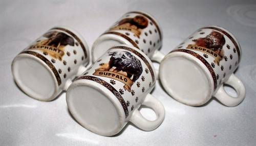 FOUR CUTE MUGS WITH PIC & DESCRIPTION ON THE BACK -  ELEPHANT, LION, BUFFALO, LEOPARD - BID PER EACH