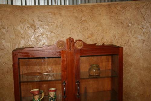 This is a truly stunning antique display cabinet.  It has fantastic detail on the front sides.