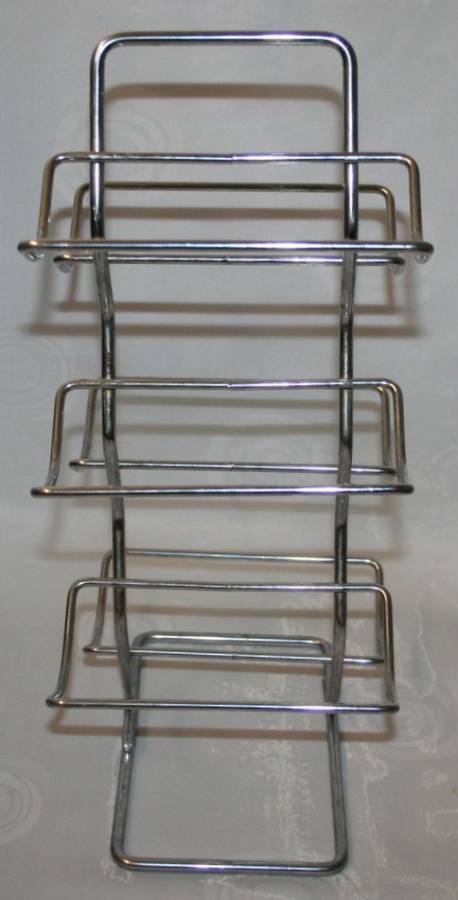 Here is a great, vintage, 5 bottle wine rack made out of Stainless steel. Stunning