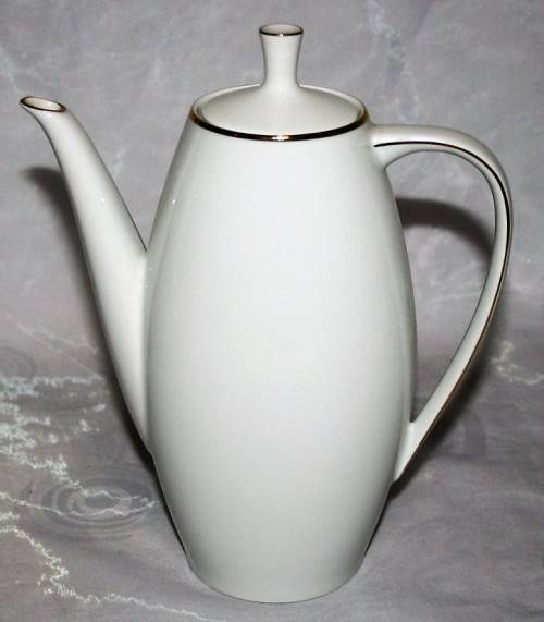 This is a lovely Tea Or Coffee Pot Vintage Porcelain by Fritz Thomas. It is spectacular with gold